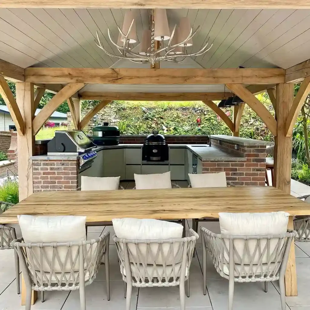 Rustic outdoor kitchen under wooden pavilion