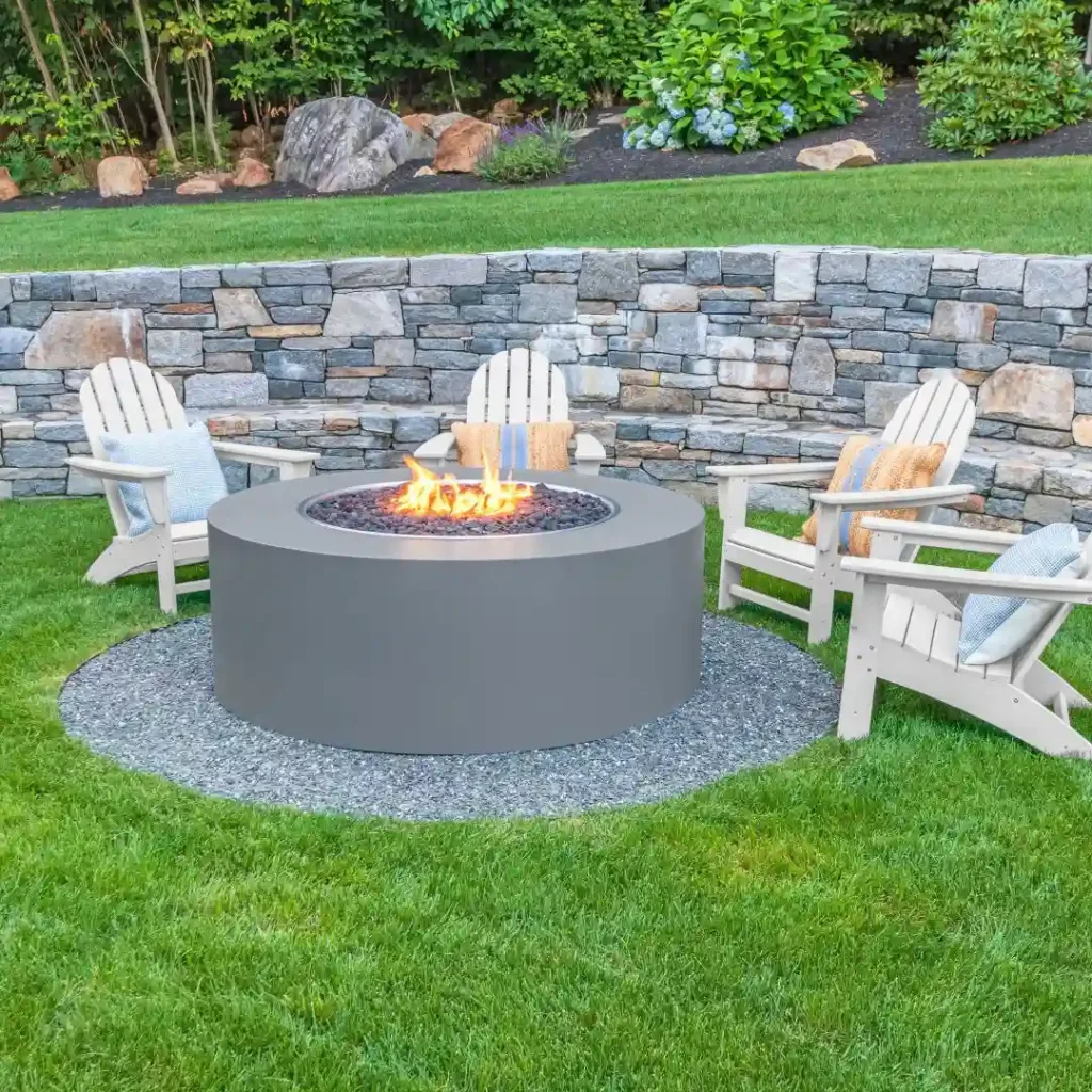 Contemporary Fire Pit with Stone Wall Backdrop