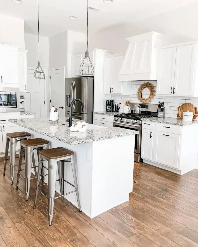 White Farmhouse Kitchen with Industrial Bar Stools