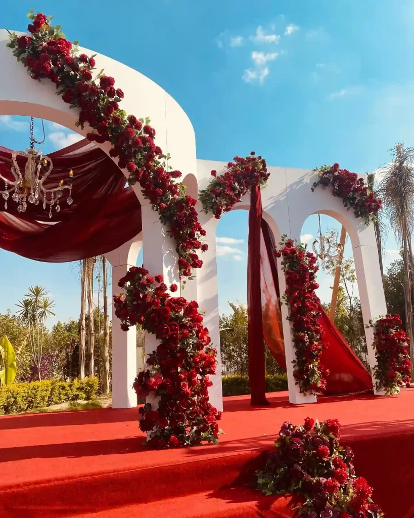 Bold Burgundy & White Arched Ceremony Stage