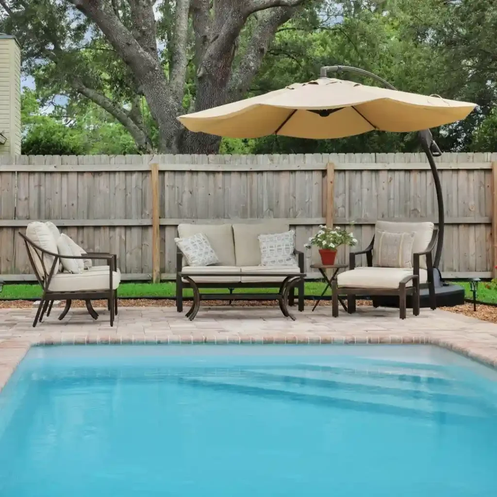 Cozy Corner Pool with Patio Lounge Set