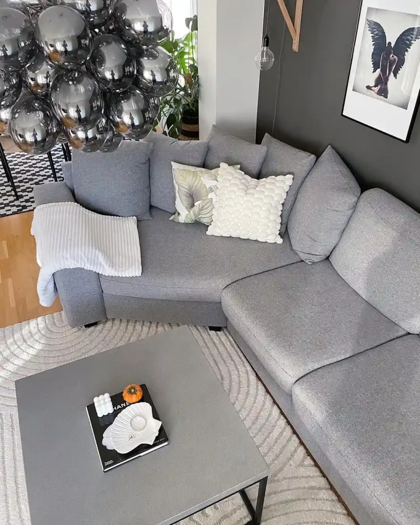 Scandinavian Gray Sofa Corner with Statement Lighting