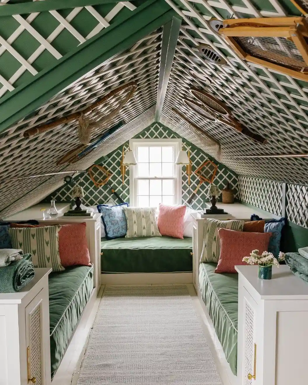 Symmetrical Green Attic Bunk Room